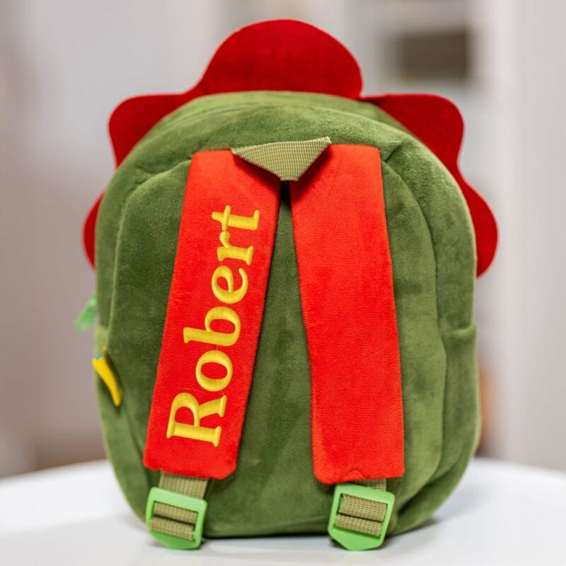 ghiozdănel dinozaur din pluș personalizat cu nume