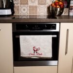 prosop de bucătărie personalizat cu numele chefului și moș crăciun